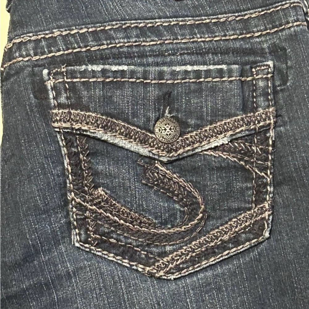 Silver Suki bootcut jeans. Distressed denim.